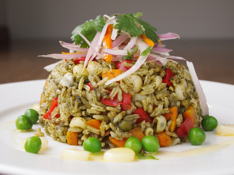Arroz con pollo is a dish prevalent in many Latin American kitchens, and Pe...